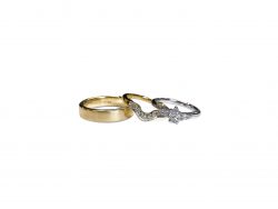 9ct Yellow Gold Brushed : Curved with diamonds with 9ct white gold 3x pear diamond engagement ring on a white background