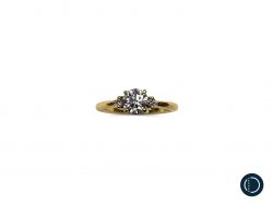 9ct Yellow Gold engagement ring with 5.5mm diamond and 2x 2mm ocean diamonds either side on a white background