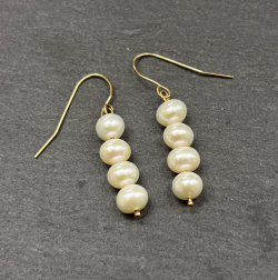 9ct Yellow Gold Earrings wih Cultured pearl Cornish jewellery on slate background