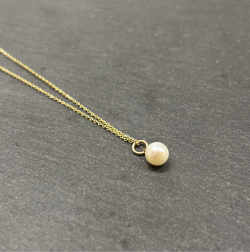 9ct Yellow Gold Necklace with Cultured pearl Cornish Jewellery on slate background