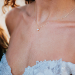 9ct Yellow Gold Necklace wih Cultured pearl on model