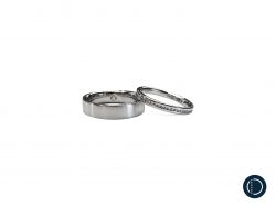 Platinum Wedding Rings with Ocean Diamonds on a white background