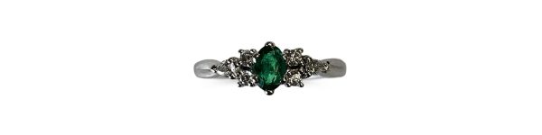 9ct White Gold Engagement Ring with Oval Emerald, Pear & Round diamonds on white background